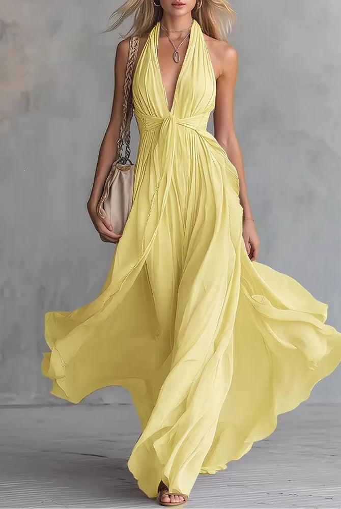 Plunging halter open back pleated maxi dress in yellow