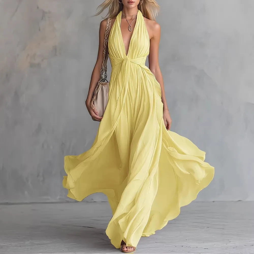 Plunging halter open back pleated maxi dress in yellow