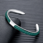 Braided leather and stainless steel cuff bracelet in silver / green