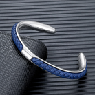 Braided leather and stainless steel cuff bracelet in silver / blue