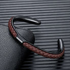 Braided leather and stainless steel cuff bracelet in black / brown