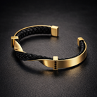 Polished steel braided leather cuff bracelet in gold
