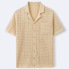 Textured jacquard knit polo in champagne