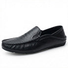 Fold down heel vegan leather travel loafer in black