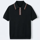 Ribbed textured knit three button polo in black
