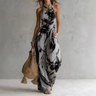 Halter neck watercolor print flowy maxi dress in black