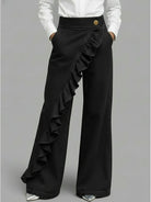 Asymmetrical ruffle detail wide leg jean in black