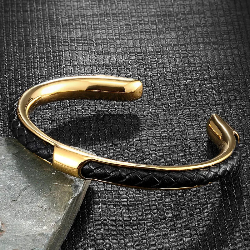 Braided leather and stainless steel cuff bracelet in gold / black