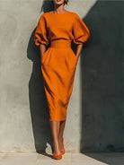 Pleated wrap midi dress with side pockets in orange