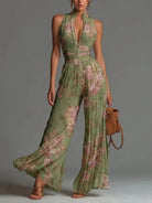 Halter neck pleated wide leg floral jumpsuit in green