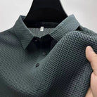 Featherlight waffle knit polo shirt in dark slate green