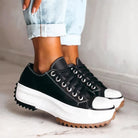 Elevated sole chunky platform sneaker in black
